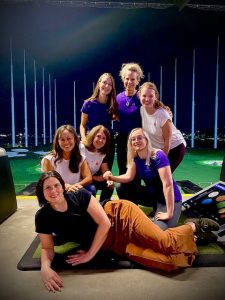Northwest Wellness Group contact page image. Photo of the Northwest Wellness team at Top Golf.